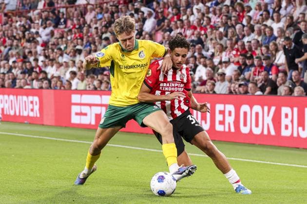 EINDHOVEN , 08-08-2026 , Philips stadium , season 2026 2027 , Dutch Eredivisie football , match between PSV and Fortuna Sittard , picture shows PSV player Sven Mijnans Fortuna Sittard player Siebe Wylin and PSV Player Amir Bouhamdi PSV - Fortuna  x205557670x Copyright:
