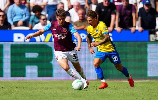 Oliver Scarles of West Ham United and Adrian Segecic of Portsmouth West Ham United v Portsmouth, EFL Carabao Cup, First Round, Football, London Stadium, London, UK - 08 Aug 2026London London Stadium United Kingdom EDITORIAL USE ONLY No use with unauthorised audio, video, data, fixture lists, club league logos or live services. Online in-match use limited to 120 images, no video emulation. No use in betting, games or single club league player publications.  Copyright: xJavierxGarcia Shutterstockx 17051072fn