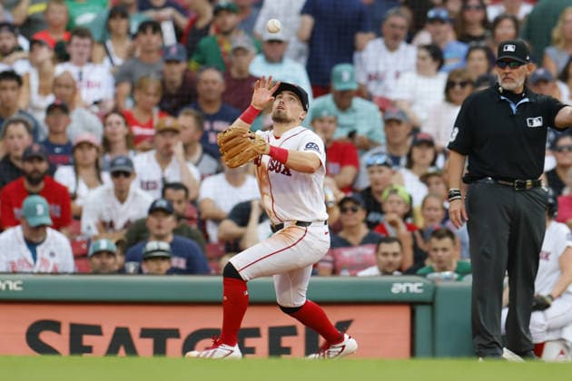 Boston Red Sox third baseman Caleb Durbin bare hands the ball during the ninth inning against the Athletics at Fenway Park in Boston, Massachusetts on Saturday, August 8, 2026.  BOP2026080820 CJxGUNTHER