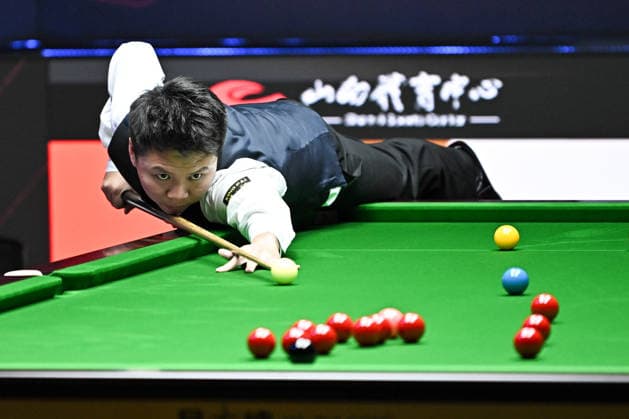 TAIYUAN, CHINA - AUGUST 08: Zhou Yuelong of China plays a shot in the first round match against Mark Williams of Wales on day 1 of the 2026 World Snooker Tour China Open at Taiyuan Binhe Sports Center on August 8, 2026 in Taiyuan, Shanxi Province of China.  Copyright: xChinaxNewsxServicex 111658816504