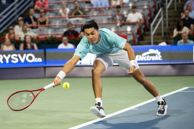 MONTREAL, QC - AUGUST 08: Brandon Nakashima from USA returns the ball against Arthur Rinderknech from France during their singles Round of 16 match on day seven of the ATP, Tennis Herren 1000 National Bank Open presented by Rogers at Stade IGA on August 8, 2026 in Montreal, Quebec, Canada. (Photo by Vincent Ethier Icon Sportswire) TENNIS: AUG 08 National Bank Open EDITORIAL USE ONLY Icon2608081252