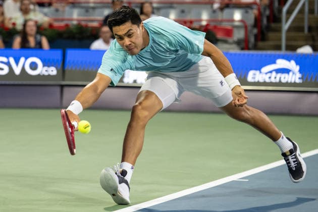MONTREAL, QC - AUGUST 08: Brandon Nakashima from USA returns the ball against Arthur Rinderknech from France during their singles Round of 16 match on day seven of the ATP, Tennis Herren 1000 National Bank Open presented by Rogers at Stade IGA on August 8, 2026 in Montreal, Quebec, Canada. (Photo by Vincent Ethier Icon Sportswire) TENNIS: AUG 08 National Bank Open EDITORIAL USE ONLY Icon2608081253