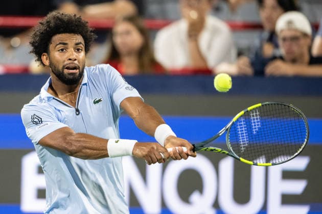 MONTREAL, QC - AUGUST 08: Arthur Fils from France returns the ball against Cameron Norrie from Great Britain during their singles Round of 16 match on day seven of the ATP, Tennis Herren 1000 National Bank Open presented by Rogers at Stade IGA on August 8, 2026 in Montreal, Quebec, Canada. (Photo by Vincent Ethier Icon Sportswire) TENNIS: AUG 08 National Bank Open EDITORIAL USE ONLY Icon2608088774