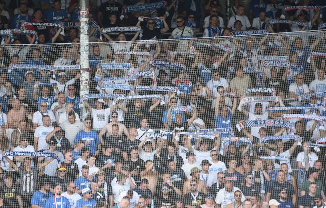 09.08.2026, xhbx, Fussball 3.Liga, TSG 1899 Hoffenheim U23 - Hansa Rostock v.l. Fans, Anhänger, Ultras, Stimmung, Schals, Fahne von Hansa Rostock (DFL DFB REGULATIONS PROHIBIT ANY USE OF PHOTOGRAPHS as IMAGE SEQUENCES and or QUASI-VIDEO) Hoffenheim *** August 9, 2026, xhbx, Soccer 3rd Division, TSG 1899 Hoffenheim U23 vs. Hansa Rostock – fans, supporters, ultras, atmosphere, scarves, Hansa Rostock flag. DFL and DFB regulations prohibit any use of photographs as image sequences and or quasi-video. Hoffenheim