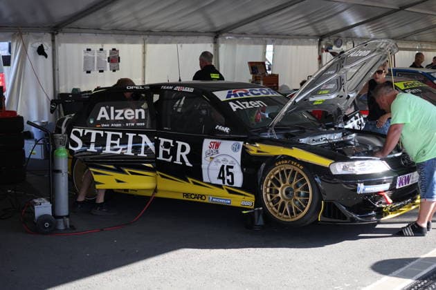RECORD DATE NOT STATED Das Fahrzeug 45 von Ruedi Aeschlimann (CHE), Opel Vectrs STW (Ex Uwe Alzen) in der Box GER, Motorsport. 53. BELMOT-Oldtimer-Grand-Prix, Super Touring Revival Rennen 1, Samstag, Nuerburgring, Nuerburg, Rheinland-Pfalz, 08.08.2026 GER, Motorsport. 53. BELMOT-Oldtimer-Grand-Prix, Super Touring Revival Rennen 1, Samstag, Nuerburgring, Nuerburg, Rheinland-Pfalz, 08.08.2026 Nuerburg *** Car No. 45 driven by Ruedi Aeschlimann (CHE), an Opel Vectra STW formerly driven by Uwe Alzen, in the pit (GER), Motorsport 53 BELMOT Classic Car Grand Prix, Super Touring Revival Race 1, Saturday, Nürburgring, Nürburg, Rhineland-Palatinate, August 8, 2026, GER, Motorsport 53 BELMOT Classic Car Grand Prix, Super Touring Revival Race 1, Saturday, Nürburgring, Nürburg, Rhineland-Palatinate, August 8, 2026, Nürburg Copyright: xEibner-Pressefoto JuergenxAugstx EP_JAT