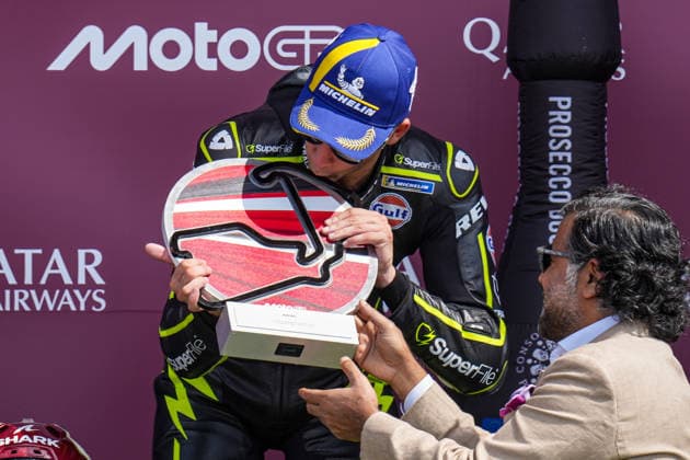 Raul Fernandez (Spain) of the SuperFile Trackhouse MotoGP Team ( 25) celebrates on the podium after winning the MotoGP Race at Round 12 of the 2026 Qatar Airways Grand Prix of Great Britain at Silverstone Circuit, Towcester, England on the 9 August 2026.  Copyright: xDavidxHornx PMI-7310-0296