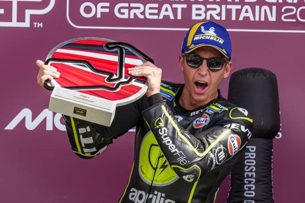 Raul Fernandez (Spain) of the SuperFile Trackhouse MotoGP Team ( 25) celebrates on the podium after winning the MotoGP Race at Round 12 of the 2026 Qatar Airways Grand Prix of Great Britain at Silverstone Circuit, Towcester, England on the 9 August 2026.  Copyright: xDavidxHornx PMI-7310-0302