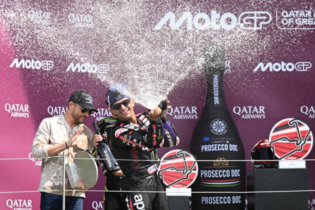 RECORD DATE NOT STATED 9th August 2026; Silverstone Circuit, Northamptonshire, England; 2026 MotoGP Grand Prix of Great Britain, Race Day; Jorge Martin of Aprilia Racing sprays prosecco from the podium SimonxWest