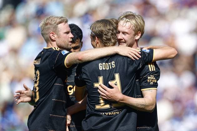 ZWOLLE , 09-08-2026 , MAC3park stadion , season 2026 2027 , Dutch Eredivisie football , match between PEC Zwolle and Ajax 0-2. picture shows Ajax player Julian Brandt scoring 0-2 and celebrates with Davy Klaassen and Mika Godts PEC - Ajax  x205582605x Copyright: