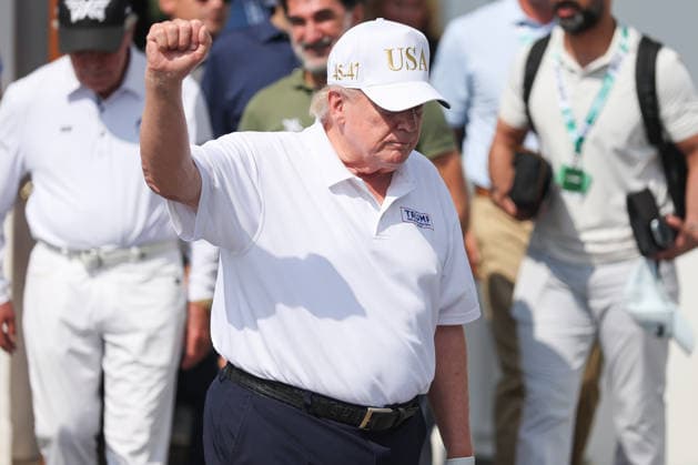 BEDMINSTER, NJ - AUGUST 09: President Donald Trump walks out of the clubhouse at Bedminster before the forth round of LIV Golf New York on August 9, 2026 at Trump National Golf Club in Bedminster, New Jersey. (Photo by Andrew Mordzynski Icon Sportswire) GOLF: AUG 09 LIV Golf New York EDITORIAL USE ONLY Icon2608098162834