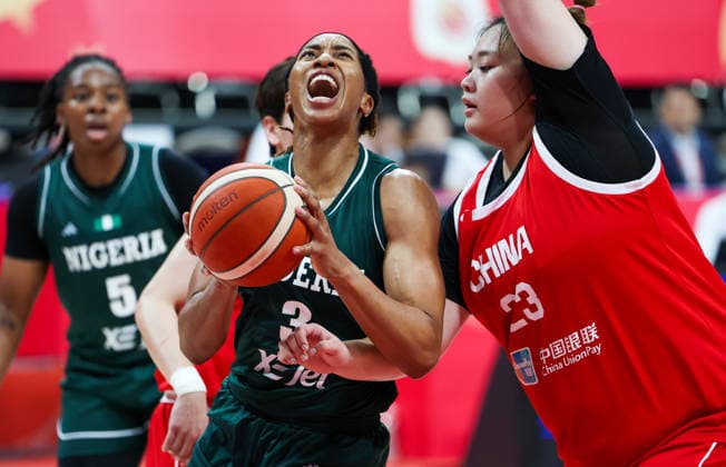 (260809) -- HAIKOU, Aug. 9, 2026 -- Pallas Kunaiyi-Akpanah (L) of Nigeria competes during a friendly basketball match between China and Nigeria in Haikou, south China s Hainan Province, Aug. 9, 2026. ) (SP)CHINA-HAIKOU-BASKETBALL-FRIENDLY-CHINA VS NIGERIA (CN) YangxGuanyu 