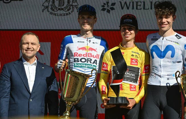 83rd Tour De Pologne 2026 - Stage 7 WIELICZKA, POLAND - AUGUST 09: President of Poland Karol Nawrocki poses alongside the top three overall finishers (L-R) runner-up Finn Fisher-Black of New Zealand and Red Bull Bora Hansgrohe, race winner Marco Brenner of Germany and Tudor Pro Cycling Team, and third-place finisher Ivan Romeo of Spain and Movistar Team, during the final podium ceremony of the 83rd Tour de Pologne 2026, Stage 7 a 12.5km individual time trial stage from Wieliczka to Wieliczka UCIWT on August 09, 2026 in Wieliczka, Poland. Wieliczka Poland  Copyright: xArturxWidakx originalFilename:widak-83rdtour260809_npCB3.jpg