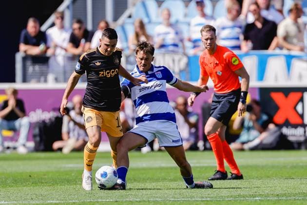 ZWOLLE , 09-08-2026 , MAC3park stadion , season 2026 2027 , Dutch Eredivisie football , match between PEC Zwolle and Ajax , picture shows Ajax player Oscar Gloukh, PEC Zwolle player Ryan Thomas PEC - Ajax  x205590050x Copyright: