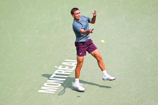 MONTREAL, QC - AUGUST 09: Daniel Merida (ESP) returns the ball during a fourth round match at National Bank Open on August 09, 2026 at IGA Stadium in Montreal, QC (Photo by David Kirouac Icon Sportswire) TENNIS: AUG 09 National Bank Open EDITORIAL USE ONLY Icon26080901026