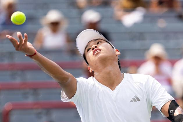 August 9, 2026, Montreal, Quebec, Canada: LEARNER TIEN (12) from USA serving in match against Thiago Agustin Tirante from Argentina in round of 16 at Canadian Open at IGA stadium in Montreal, Quebec, Canada on 2026-08-09 Montreal Canada - ZUMAl189 20260809_zsp_l189_050 Copyright: xYannickxLegarex