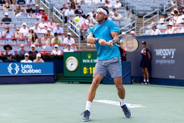 August 9, 2026, Montreal, Quebec, Canada: THIAGO AUGUSTIN TIRANTE from Argentina backhand in match against Learner Tien (12) from USA in round of 16 at Canadian Open at IGA stadium in Montreal, Quebec, Canada on 2026-08-09 TENNIS: Canadian Open Montreal 2026  - ZUMAl189 20260809_zsp_l189_047 Copyright: xYannickxLegarex