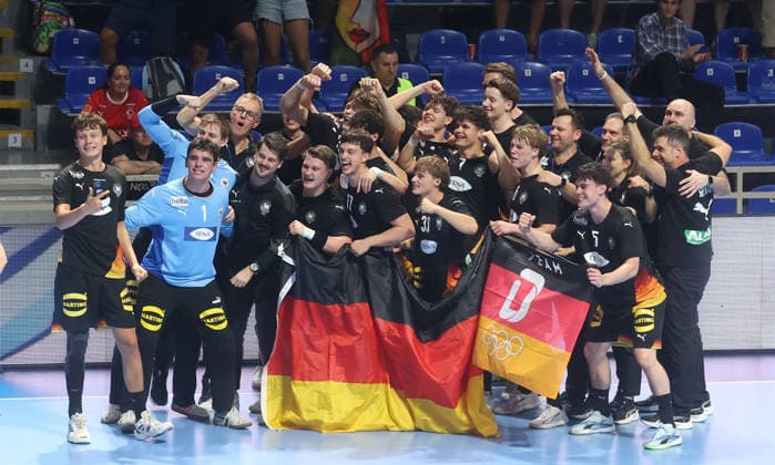 09.08.2026 Belgrade Germany-Slovenia European U18 men s handball championship final tournament final match Germany U18 handball team celebrate victory with German flag before trophy ceremony :