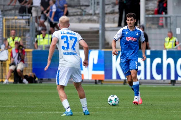 v.li.: Milosz Brzozowski (Rostock, 37), Sean Dulic (TSG II, 3), Aktion, Action, Spielszene, 09.08.2026, Sinsheim (Deutschland), Fussball, 3. Liga, TSG 1899 Hoffenheim II - Hansa Rostock, DFB DFL REGULATIONS PROHIBIT ANY USE OF PHOTOGRAPHS AS IMAGE SEQUENCES AND OR QUASI-VIDEO. *** v li Milosz Brzozowski Rostock, 37, Sean Dulic TSG II, 3, Action, Game Scene, 09 08 2026, Sinsheim, Germany, soccer, 3rd League, TSG 1899 Hoffenheim II vs. Hansa Rostock, DFB and DFL regulations prohibit any use of photographs as image sequences and or quasi-video xozx
