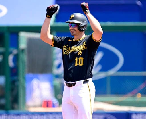 Pittsburgh Pirates left fielder Bryan Reynolds (10) celebrates at second base following his ground rule double in the first inning against the New York Mets at PNC Park on Sunday, August 9, 2026 in Pittsburgh.  PIT2026080911 ArchiexCarpenter