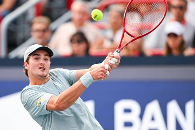 MONTREAL, QC - AUGUST 09: Joao Fonseca (BRA) returns the ball during a fourth round match at National Bank Open on August 09, 2026 at IGA Stadium in Montreal, QC (Photo by David Kirouac Icon Sportswire) TENNIS: AUG 09 National Bank Open EDITORIAL USE ONLY Icon26080909826