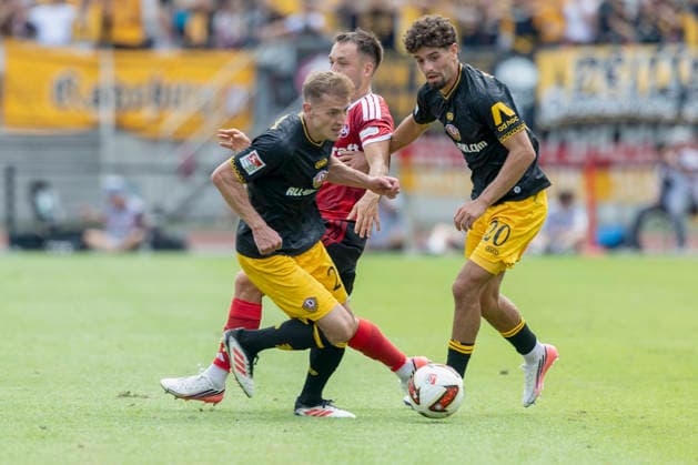 v.l.n.r.: Niklas Hauptmann (Dynamo Dresden), Julian Justvan (1. FC Nürnberg) und Ben Bobzien (Dynamo Dresden), im 2. Bundesliga-Spiel zwischen dem 1. FC Nürnberg und Dynamo Dresden im Max-Morlock-Stadion, Nürnberg, Deutschland, am 9. August 2026. in action during the 2nd Bundesliga match between 1. FC Nuremberg and Dynamo Dresden at the Max-Morlock Stadium, Nuremberg, Germany, on August 9, 2026. DFB DFL REGULATIONS PROHIBIT ANY USE OF PHOTOGRAPHS AS IMAGE SEQUENCES AND OR QUASI-VIDEO, *** From left to right: Niklas Hauptmann of Dynamo Dresden, Julian Justvan of 1 FC Nuremberg, and Ben Bobzien of Dynamo Dresden, in the 2. Bundesliga match between 1 FC Nuremberg and Dynamo Dresden at the Max Morlock Stadium, Nuremberg, Germany, on August 9, 2026, in action during the 2nd Bundesliga match between 1 FC Nuremberg and Dynamo Dresden at the Max Morlock Stadium, Nuremberg, Germany, on August 9, 2026. DFB and DFL regulations prohibit any use of photographs as image sequences and or quasi-video, Copyright: HMBxMedia xHeikoxBecker