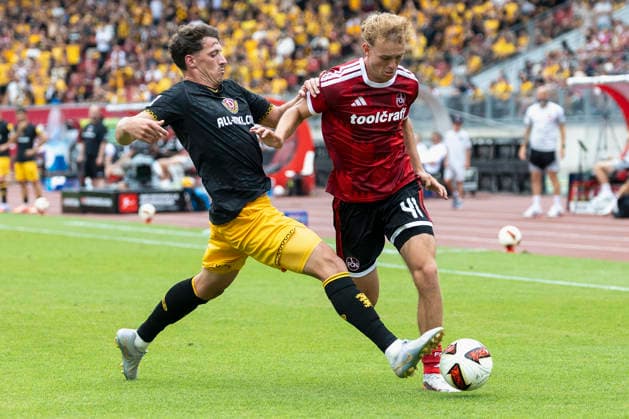 v.l.n.r.: Nicolai Rapp (Dynamo Dresden) und Eric Porstner (1. FC Nürnberg), im 2. Bundesliga-Spiel zwischen dem 1. FC Nürnberg und Dynamo Dresden im Max-Morlock-Stadion, Nürnberg, Deutschland, am 9. August 2026. in action during the 2nd Bundesliga match between 1. FC Nuremberg and Dynamo Dresden at the Max-Morlock Stadium, Nuremberg, Germany, on August 9, 2026. DFB DFL REGULATIONS PROHIBIT ANY USE OF PHOTOGRAPHS AS IMAGE SEQUENCES AND OR QUASI-VIDEO, *** From left to right: Nicolai Rapp of Dynamo Dresden and Eric Porstner of 1 FC Nuremberg, in the 2. Bundesliga match between 1 FC Nuremberg and Dynamo Dresden at the Max Morlock Stadium, Nuremberg, Germany, on August 9, 2026, in action during the 2nd Bundesliga match between 1 FC Nuremberg and Dynamo Dresden at the Max Morlock Stadium, Nuremberg, Germany, on August 9, 2026 DFB and DFL regulations prohibit any use of photographs as image sequences and or quasi-video, Copyright: HMBxMedia xHeikoxBecker