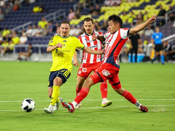 August 9, 2026: Nashville SC midfielder Alex Muyl (19) kicks the ball away from defenders during a Leagues Cup match between Atletico de San Luis and Nashville SC at Geodis Park in Nashville, TN. CSM Nashville United States of America - ZUMAc04_ 20260809_zma_c04_088 Copyright: xStephenxFurstx