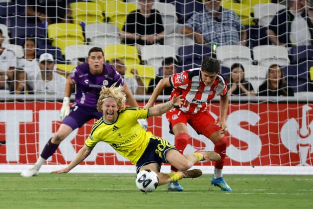 NASHVILLE, TN - AUGUST 09: Nashville SC midfielder Edvard Tagseth (20) is fouled by AtlŽtico San Luis midfielder Benjam’n Galdames (7) during a LeagueÕs Cup match between Nashville SC and AtlŽtico San Luis, August 9, 2026, at GEODIS Park in Nashville, Tennessee. (Photo by Matthew Maxey Icon Sportswire) SOCCER: AUG 09 Leagues Cup Nashville vs Atletico de San Luis EDITORIAL USE ONLY Icon26080929