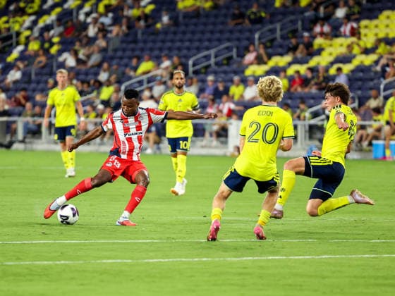 August 9, 2026: Atletico de San Luis midfielder Johan Caicedo (13) kicks the ball into a sliding Nashville SC midfielder Matthew Corcoran (16) during a Leagues Cup match between Atletico de San Luis and Nashville SC at Geodis Park in Nashville, TN. CSM Leagues Cup 2026: Atletico De San Luis Vs Nashville SC AUG 09  - ZUMAc04_ 20260809_zma_c04_105 Copyright: xStephenxFurstx