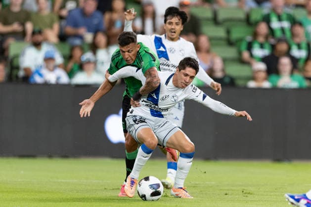 Myrto Uzuni (C-L) of Austin FC vies for the ball with Carlos Baltazar of Puebla during a Leagues Cup match between Austin FC and Puebla at Q2 Stadium in Austin, Texas, USA, 09 August 2026. Leagues Cup: Austin FC vs Puebla !ACHTUNG: NUR REDAKTIONELLE NUTZUNG!  Copyright: xCarlosxRamírezx AME7569 20260810-55021108871_1