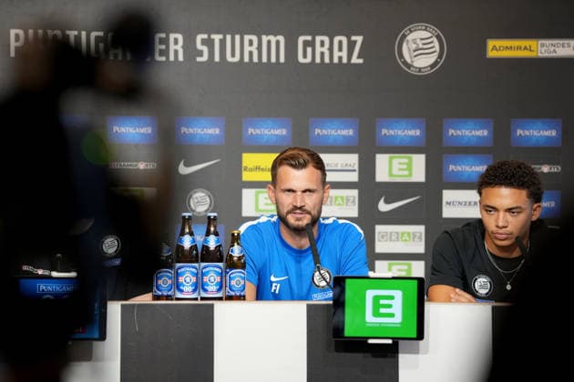 SOCCER - UEFA CL, Sturm vs Fenerbahce GRAZ,AUSTRIA,10.AUG.26 - SOCCER - UEFA Champions League, qualification, Sturm Graz vs Fenerbahce Istanbul, preview, press conference, PK, Pressekonferenz Sturm. Image shows head coach Fabio Ingolitsch and Jakob Peter Hoedl (Sturm).  GEPAxpictures xMichaelxRiedler