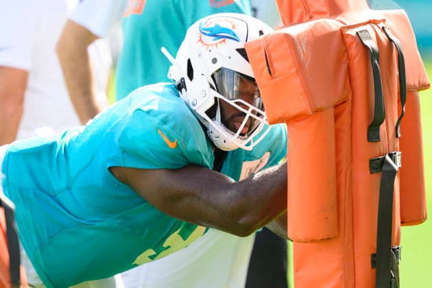 MIAMI GARDENS, FL - AUGUST 10: Miami Dolphins defensive lineman Matthew Butler (91) runs a blocking drill during the Miami Dolphins Training Camp on August 10 2026, at the Baptist Health Training Complex in Miami Gardens, FL. (Photo by Doug Murray Icon Sportswire) NFL, American Football Herren, USA AUG 10 Dolphins Training Camp EDITORIAL USE ONLY Icon796260810023