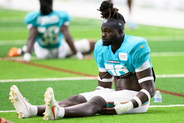MIAMI GARDENS, FL - AUGUST 10: Miami Dolphins linebacker Ronnie Harrison Jr. (56) stretches during the Miami Dolphins Training Camp on August 10 2026, at the Baptist Health Training Complex in Miami Gardens, FL. (Photo by Doug Murray Icon Sportswire) NFL, American Football Herren, USA AUG 10 Dolphins Training Camp EDITORIAL USE ONLY Icon796260810114