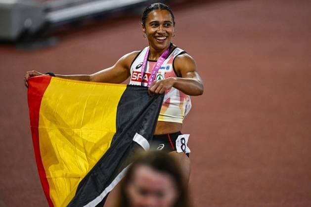 Belgian Delphine Nkansa celebrates with her bronze medal and the Belgian flag after the final of the women s 100m race at the European Athletics Championships (August 10-18) in Birmingham, United Kingdom, on Monday 10 August 2026. ERICxLALMAND  x183110024x