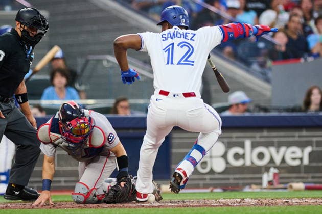 August 10, 2026, Toronto, On, Canada: Toronto Blue Jays Jesus Sanchez (12) is hit by a pitch from Boston Red Sox s Sonny Gray (54), during fourth inning MLB, Baseball Herren, USA baseball action in Toronto, on Monday, Aug. 10, 2026. Canada News - August 10, 2026  - ZUMAc35_ 20260810_zaf_c35_095 Copyright: xSammyxKoganx