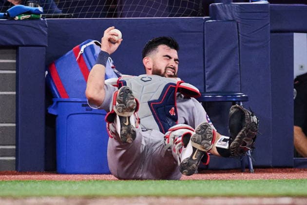 August 10, 2026, Toronto, On, Canada: Boston Red Sox s Connor Wong (12) grimaces as he makes a catch in foul territory during seventh inning MLB, Baseball Herren, USA baseball action against the Toronto Blue Jays in Toronto, on Monday, Aug. 10, 2026. Canada News - August 10, 2026  - ZUMAc35_ 20260810_zaf_c35_128 Copyright: xSammyxKoganx