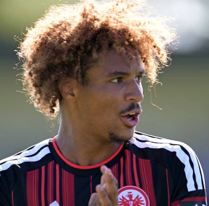 Jean Matteo Bahoya takes photos at the soccer exhibition match between Eintracht Frankfurt and Hull City on August 8, 2026, in Frankfurt. DFL and DFB regulations prohibit any use of photographs as image sequences and or quasi-video.
