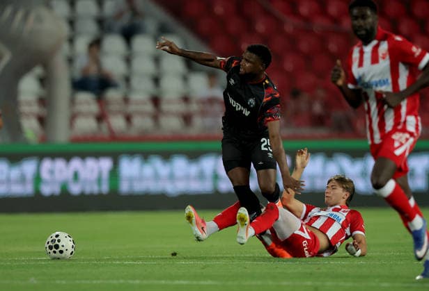 Crvena Zvezda v Hapoel Beer Sheva, UEFA Champions League, third qualifying round, 2nd leg Season 2026 2027 Belgrade, Serbia. 11th August, 2026. Hapoel s Lucas Ventura (L) vies with Crvena Zvezda s Vasilije Kostov (R) during the UEFA Champions League, third qualifying round, 2nd leg football match between Crvena Zvezda (Red Star) and Hapoel Beer-Sheva at the Rajko Mitic Stadium on August 11, 2026 in Belgrade, Serbia. Belgrade Serbia Copyright: xPedjaxMilosavljevicx x