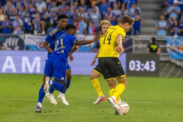 Villiam Granath of Mjallby and Camara Suleiman of SK Slovan Bratislava seen during UEFA Champions league third qualifying round game between teams of SK Slovan Bratislava and Mjallby (Dominika Kortvelyesiova Ball Raw Images) Bratislava Tehelne Pole stadium Slovakia Copyright: xDominikaxKortvelyesiovax DKOR1196