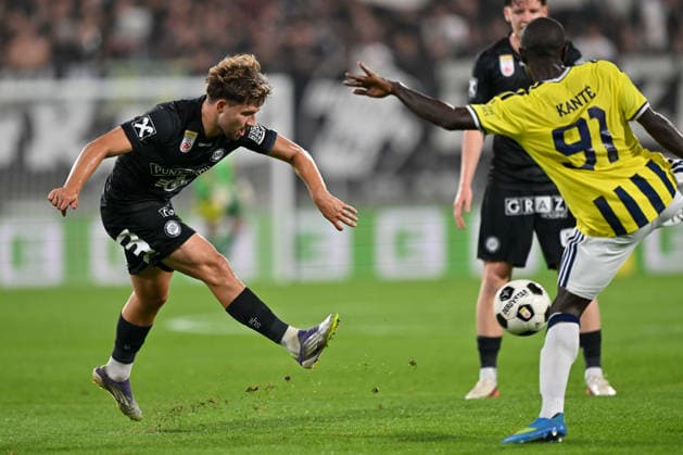 SOCCER - UEFA CL, Sturm vs Fenerbahce GRAZ,AUSTRIA,11.AUG.26 - SOCCER - UEFA Champions League, qualification, SK Sturm Graz vs Fenerbahce Istanbul. Image shows Simon Seidl (Sturm) and N Golo Kante (Fenerbahce).  GEPAxpictures xAvnixRetkoceri