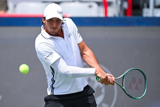 MONTREAL, QC - AUGUST 11: Luciano Darderi (ITA) returns the ball during a quarterfinal match at National Bank Open on August 11, 2026 at IGA Stadium in Montreal, QC (Photo by David Kirouac Icon Sportswire) TENNIS: AUG 11 National Bank Open EDITORIAL USE ONLY Icon26081102726