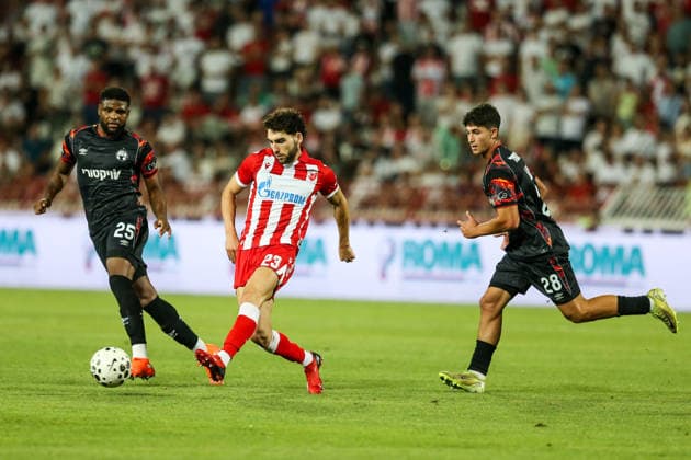 Crvena zvezda v Hapoel Beer Sheva - UEFA Champions League BELGRADE, SERBIA - AUGUST 11: Nair Tiknizyan of Crvena Zvezda in action against Lucas Ventura (25) of Hapoel Beer Sheva during UEFA Champions League qualifying match between Crvena Zvezda and Hapoel Beer Sheva at Rajko Mitic Stadium on August 11, 2026. Filip Stevanovic Anadolu Belgrade Serbia. Editorial use only. Please get in touch for any other usage.  Copyright: x2026xAnadoluxFilipxStevanovicx