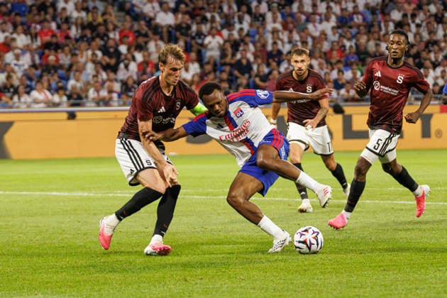 Lois Openda and Assigner Sorensen seen during UEFA Champions League third round qualifying game between teams of Olympique Lyonnais Lyon and Sparta Praha (Quentin Motiel-Font Ball Raw Images) Decines-Charpieu Groupama Stadium France Copyright: xQuentinxMontiel-Fontx QuentinLyonspart262700042