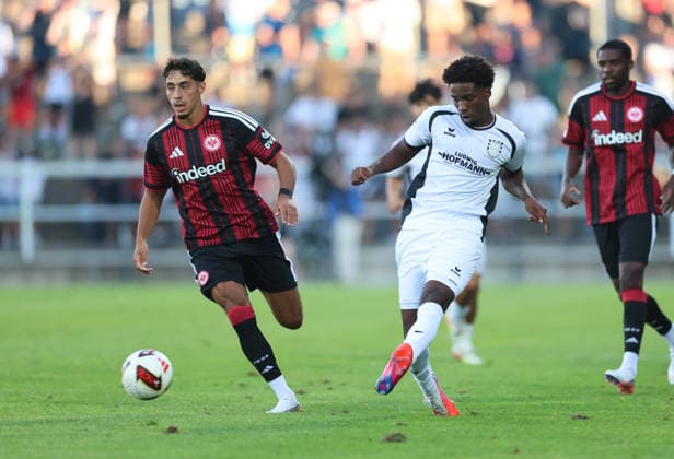 12.08.2026, Fussball Testspiel, FSV Frankfurt - Eintracht Frankfurt, v.l., Fares Chaibi (Eintracht Frankfurt), Uche Obiogumu (FSV Frankfurt) DFL DFB REGULATIONS PROHIBIT ANY USE OF PHOTOGRAPHS AS IMAGE SEQUENCES AND OR QUASI-VIDEO. xdcx *** August 12, 2026, Soccer friendly match, FSV Frankfurt vs. Eintracht Frankfurt, from left: Fares Chaibi (Eintracht Frankfurt), Uche Obiogumu (FSV Frankfurt). DFL and DFB regulations prohibit any use of photographs as image sequences and or quasi-video. xdcx Copyright: HMBxMedia Claus