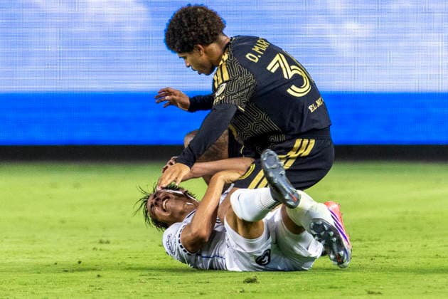 August 12, 2026, Los Angeles, California, USA: Club Quero taro defender Daniel Parra (27) and Los Angeles FC forward David Martinez (30) vie for the ball during a Leagues Club soccer match on Wednesday, Aug. 12, 2026 in Los Angeles. Leagues Club 2026: LAFC 5: 4 Club Quero Taro  - ZUMAc68_ 20260812_zaf_c68_022 Copyright: xRingoxChiux