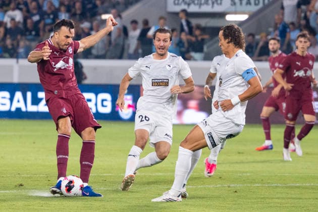 SOCCER - UEFA EL, Pafos vs RBS LIMASSOL,CYPRUS,13.AUG.26 - SOCCER - UEFA Europa League, qualification, Pafos FC vs Red Bull Salzburg. Image shows Haris Tabakovic (RBS) and Ivan Sunjic (Pafos).  GEPAxpictures xXenophonxKarakalo