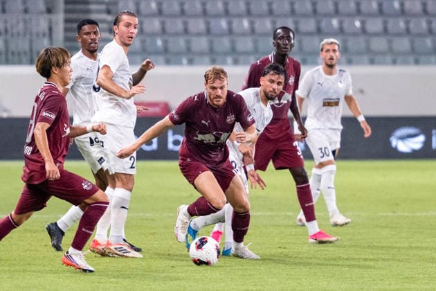 SOCCER - UEFA EL, Pafos vs RBS LIMASSOL,CYPRUS,13.AUG.26 - SOCCER - UEFA Europa League, qualification, Pafos FC vs Red Bull Salzburg. Image shows Sota Kitano and Yorbe Vertessen (RBS).  GEPAxpictures xXenophonxKarakalos