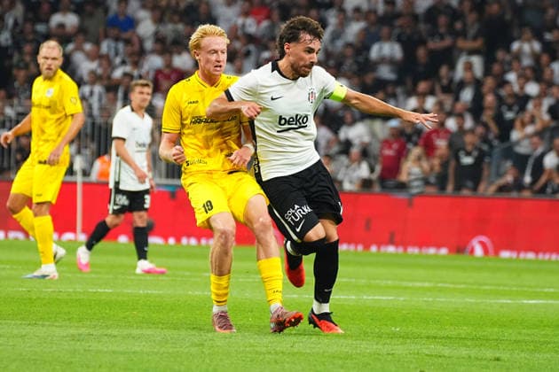 ISTANBUL, TURKEY - AUGUST 13: Orkun Kokcu (R) of Besiktas and Tom Sloncik (19) of Hradec Kralove during the UEFA Europa League 2026 27 third qualifying round second leg match between Besiktas JK and Hradec Kralove at Besiktas Park on August 13, 2026 in Istanbul, Turkey. Istanbul Besiktas Turkey Copyright: xSeskimphotox Besiktas-Hradec-1308 (22)