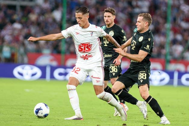 13.08.2026, Zabrze Liga Europy UEFA sezon 2026 27 runda III kwalifikacji, Gornik Zabrze - Ferencvaros Budapeszt - UEFA Europa League football Match season 2026 27 round III qualification Gornik Zabrze - Ferencvaros Budapest Nz. Kacper Urbanski Philippe Rommens Fot. Michal Chwieduk Arena Akcji NEWSPIX.PL --- newspix.pl 