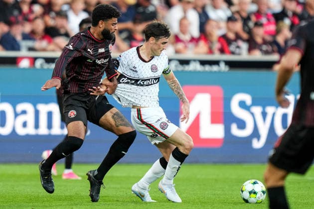 UEFA Europa Conference League Third Qualifying Round Second Leg, MCH Arena, Denmark 13 8 2026 FC Midtjylland vs Bohemians Bohemians™ Dawson Devoy is challenged by Midtjylland™s Philip Billing Dawson Devoy is challenged by Philip Billing 13 8 2026  Copyright: xx 20260813-214805-L-2